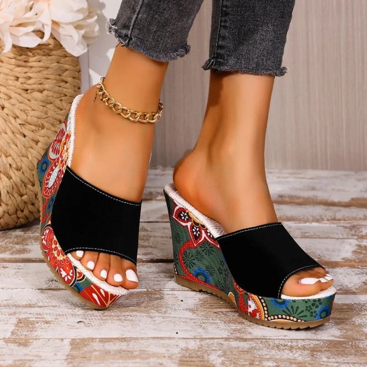 Talora - Sculptural Mules With a Floral Heel