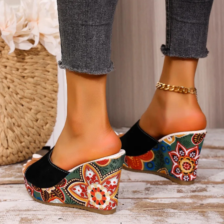 Talora - Sculptural Mules With a Floral Heel