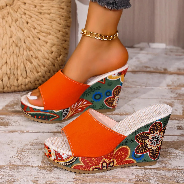 Talora - Sculptural Mules With a Floral Heel