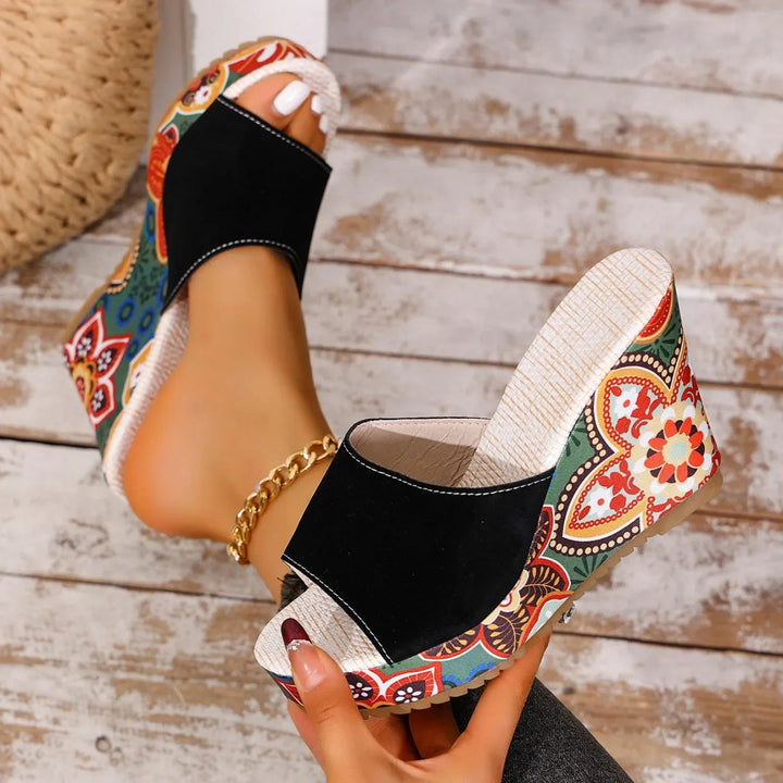 Talora - Sculptural Mules With a Floral Heel