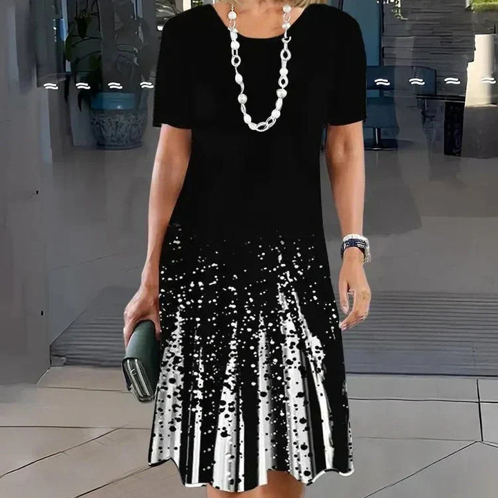 Lourah – Printed Pleated Midi Dress